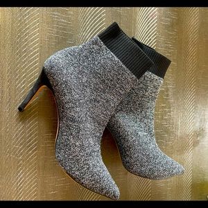 Black and silver, never worn. Fits like a sock.